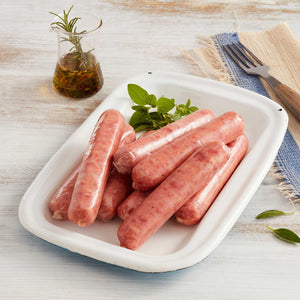 Salchichas Desayuno Tipo sabor Ranchero Marca Sagal Servidas en un Plato con Cubiertos